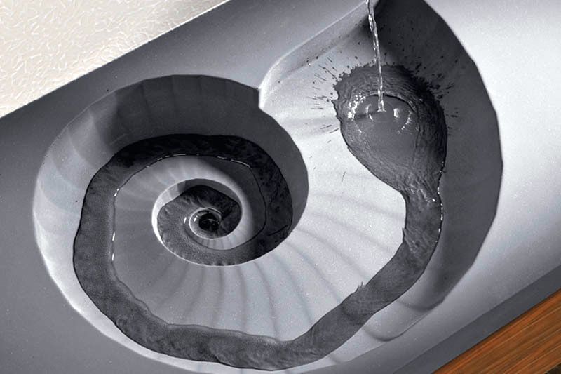 Concrete sink in the shape of an ammonite