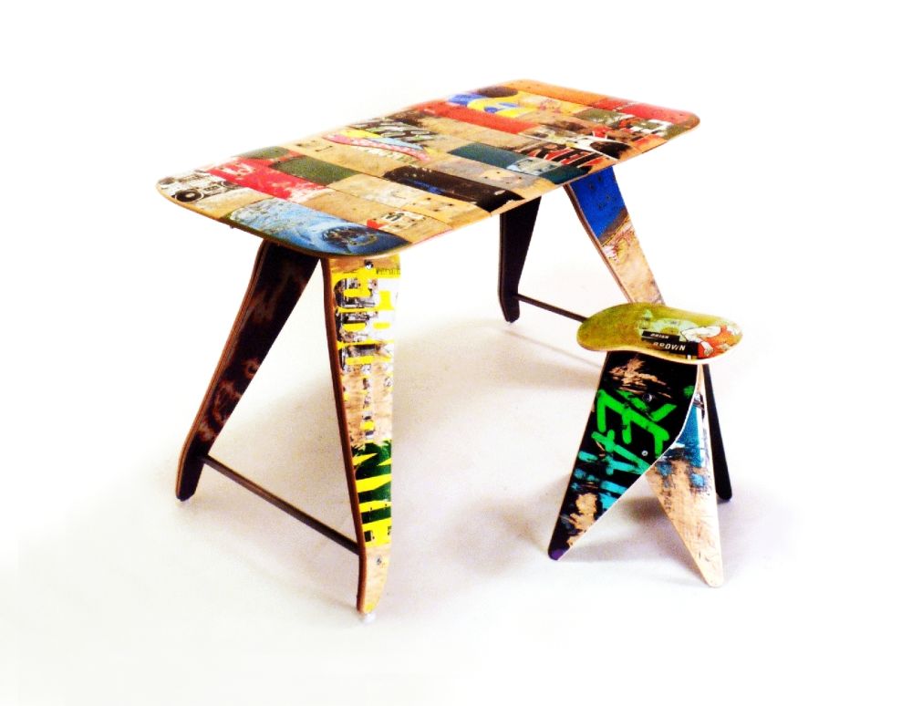 Desk and stool of recycled broken skateboards