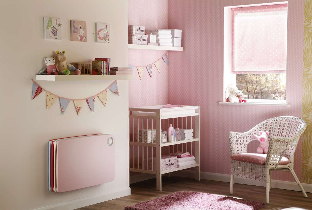 Child safe wall heater in pink and red designed for a girl's bedroom