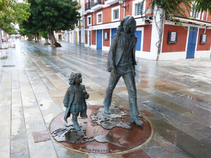 Bronze statues honoring centers of Hippie Culture as shown on world map on ground