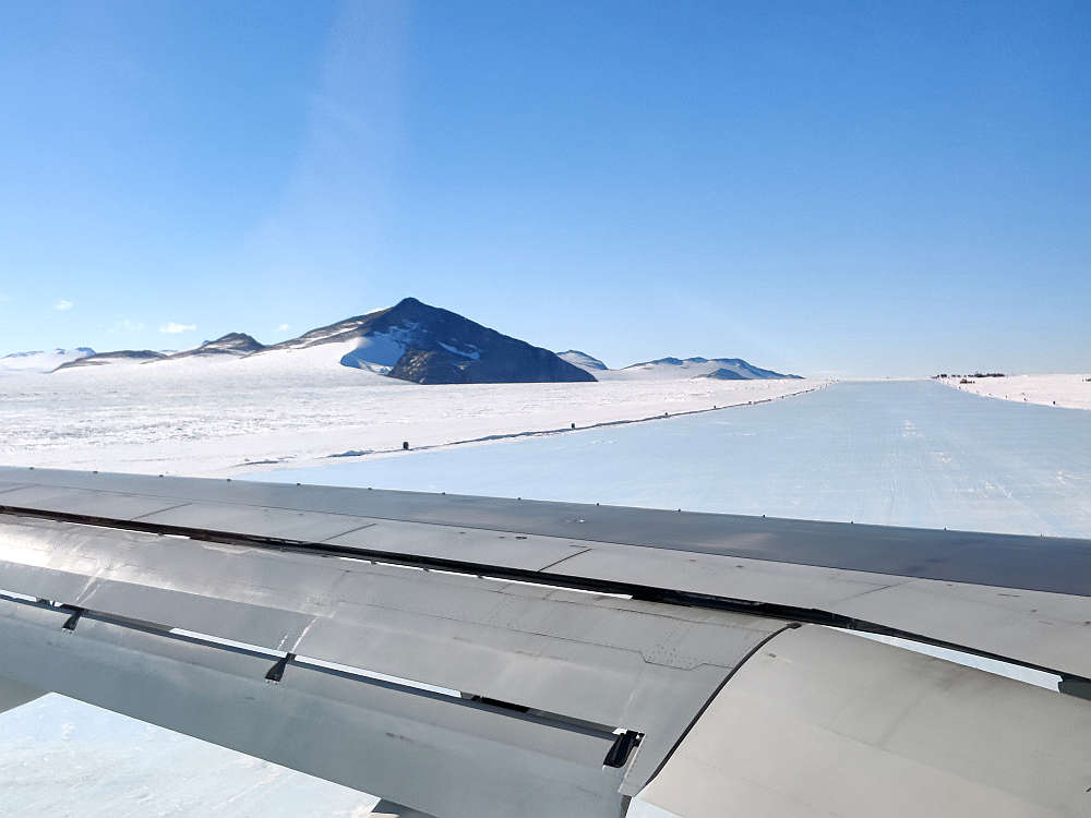 Plane landing on Union Glacier blue ice runway