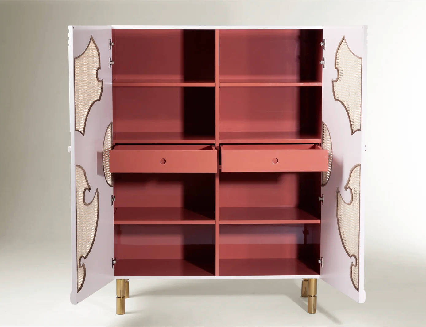 Inside of bar cabinet with contrasting colors to the exterior